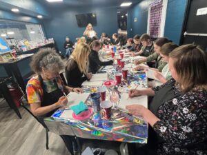 Group working on their paint creations!